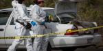 Encuentran vehículo con restos humanos en bulevar 2000