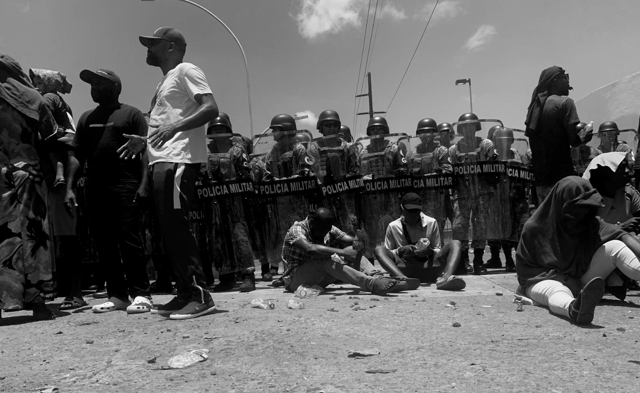 Enfrentamiento entre GN y migrantes deja dos heridos en Tapachula