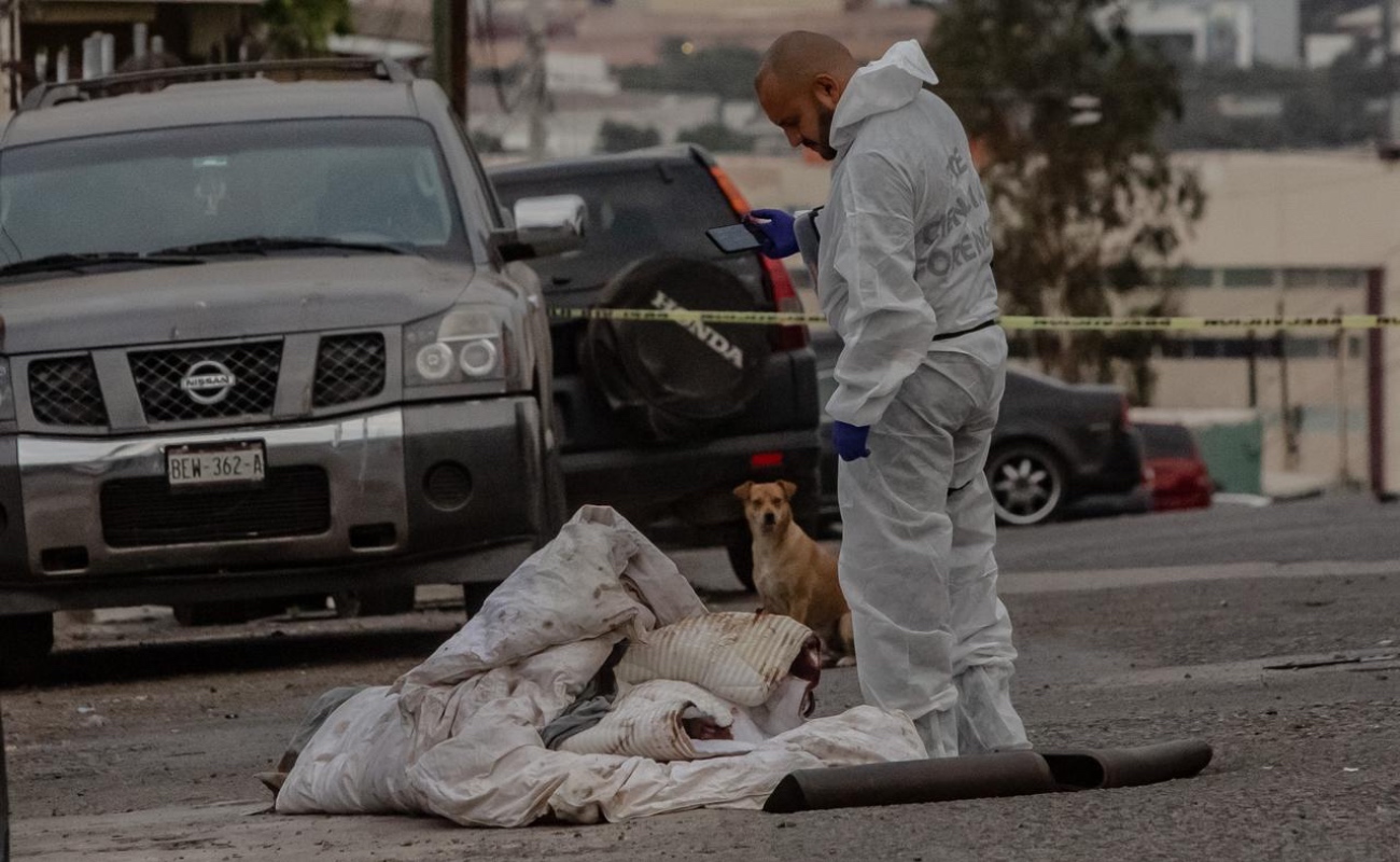 Encuentran cuerpo "encobijado" en la colonia Postal