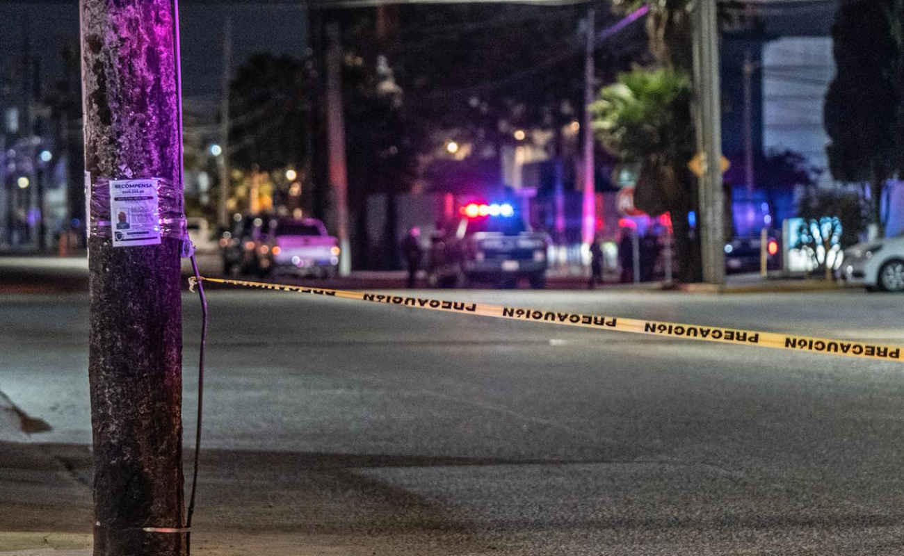 Abandonan cadáver con amenaza en Ciudad Industrial