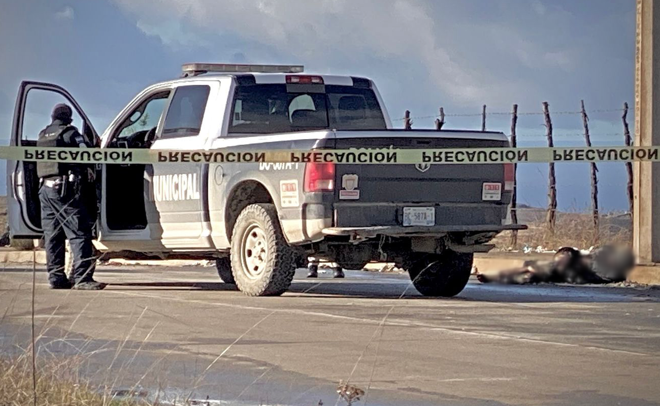 Hallan cuerpo calcinado en la vía pública de la colonia Palma Real